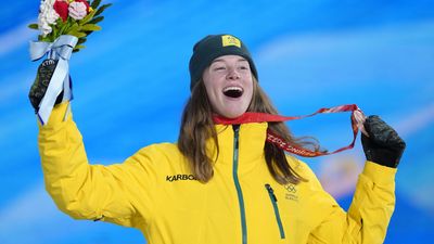 Tess Coady shows her bronze medal.