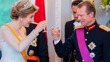Queen Mathilde of Belgium and Grand Duke Henri of Luxembourg bring out a toast during a gala dinner at the Royal Castle of Laeken 