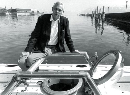 Swiss oceanographer Jacques Piccard, poses atop of his submarine "F. A. Forel", at a mooring on Lake Geneva, Switzerland.