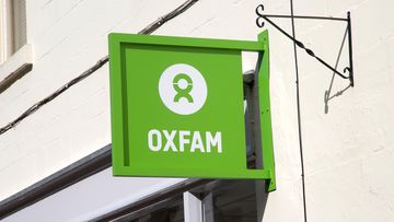 An Oxfam charity shop sign in Wiltshire, England. (Getty)