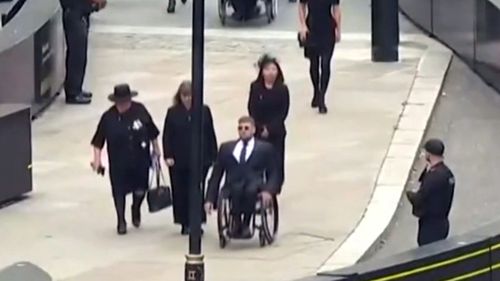 Dylan Alcott arrives at the Queen's funeral.