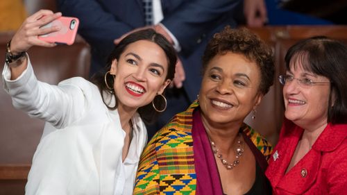 Alexandria Ocasio-Cortez, a freshman Democrat representing New York's 14th Congressional District, takes a selfie with Rep Ann McLane Kuster, D-NH, and Rep Barbara Lee, D-Calif.