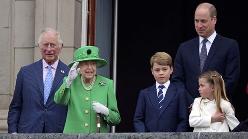 (L-R) Prince Charles, Queen Elizabeth II, Prince George, Prince William and Princess Charlotte on the balcony during the Platinum Jubilee Pageant outside Buckingham Palace in London, Sunday June 5, 2022, on the last of four days of celebrations to mark the Platinum Jubilee. 