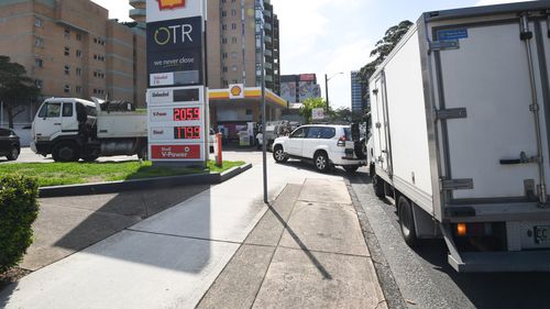 Long queues for petrol at a Sydney service station.