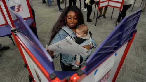 A young voter prepares to vote in Cincinnati, Ohio.