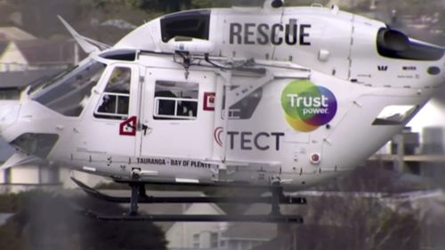 A helicopter is dispatched to the crash scene in Waikato, New Zealand. (TVNZ via AP)