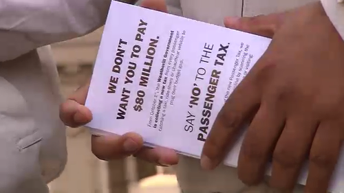 The United Taxi Association handed out flyers earlier today. (9NEWS)