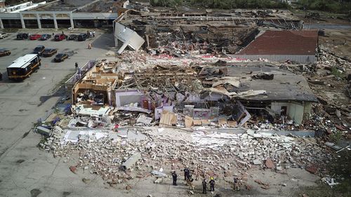 The Northridge Shopping Center on N. Dixie Highway in Dayton, Ohio lies in shambles after a tornado struck.