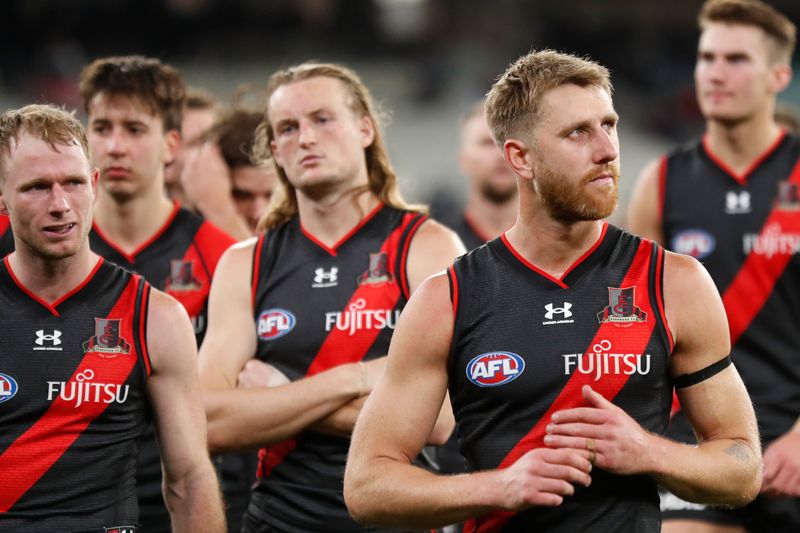 Dyson Heppell of the Bombers looks dejected after a loss during the 2022 AFL Round 13 match between the Essendon Bombers and the Carlton Blues at the Melbourne Cricket Ground on June 10, 2022 in Melbourne, Australia. (Photo by Michael Willson/AFL Photos via Getty Images)