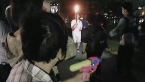 Japan Olympic torch relay water pistol
