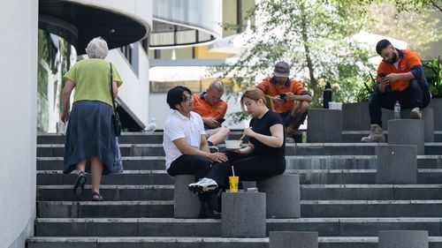 Generic scenes of young professional workers in suits in the CBD