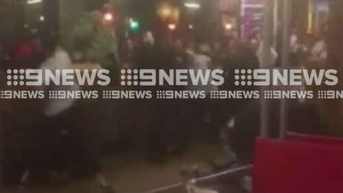 More than 10 people were filmed fighting. (9NEWS)