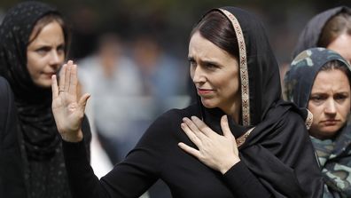 New Zealand Prime Minister Jacinda Ardern waves as she leaves Friday prayers at Hagley Park in Christchurch, New Zealand. Ardern was hailed around the world for her decisive response to the two mosque shootings by a white nationalist who killed 50 worshippers in Christchurch mosques on 15 March 2019. Community leaders and researchers say that for too long, terrorism was considered a "Muslim problem" and that a double standard persists when attacker is white and non-Muslim.