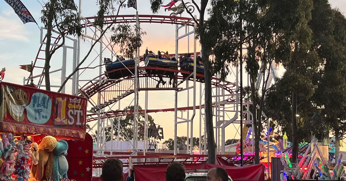 Woman 'retrieving phone' when she was struck by roller coast at Melbourne Royal Show - 9News