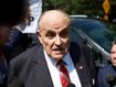 Rudy Giuliani speaks to the media after leaving the Fulton County jail on August 23 in Atlanta.