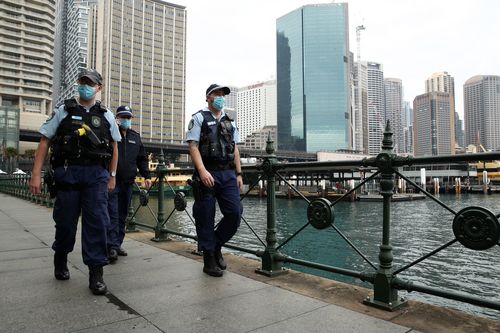 NSW Police patrol Sydney's Circular Quay as the city endures its ninth weekend of lockdown.
