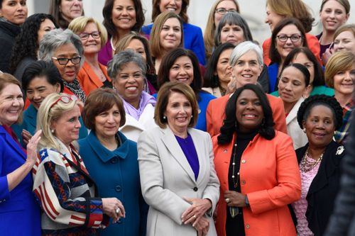 Nancy Pelosi poses for a photo with other female members of Congress.