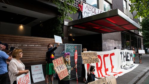 Activists in support of the refugees held at Melbourne's Park Hotel,  where Novak Djokovic was taken pending his removal from the country after his visa was cancelled.