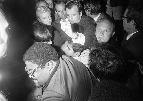 Sirhan Sirhan, then 23, (under raised arm) is pummelled by a crowd, after he shot Senator Robert F. Kennedy in the Hotel Ambassador. (Getty)