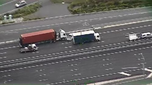 The ute driver tried to squeeze the vehicle between two trucks. (Queensland Police Service)