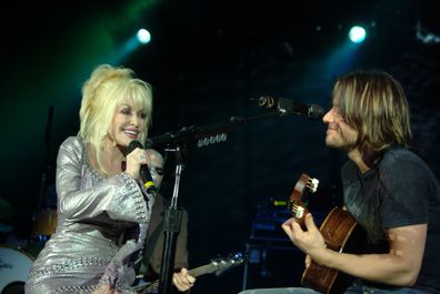 Dolly Parton and Keith Urban performing on stage at the Music City Jam in Nashville, February 2006
