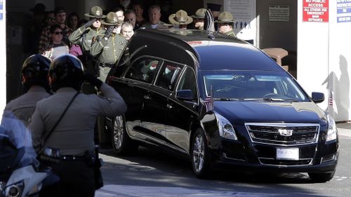 A police procession was today held in the streets of Thousand Oaks for sergeant Helus as his body was transported from the hospital.