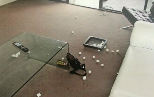 A police photograph of Gable Tostee’s apartment taken after Warriena Wright’s death shows scattered rocks. (AAP)