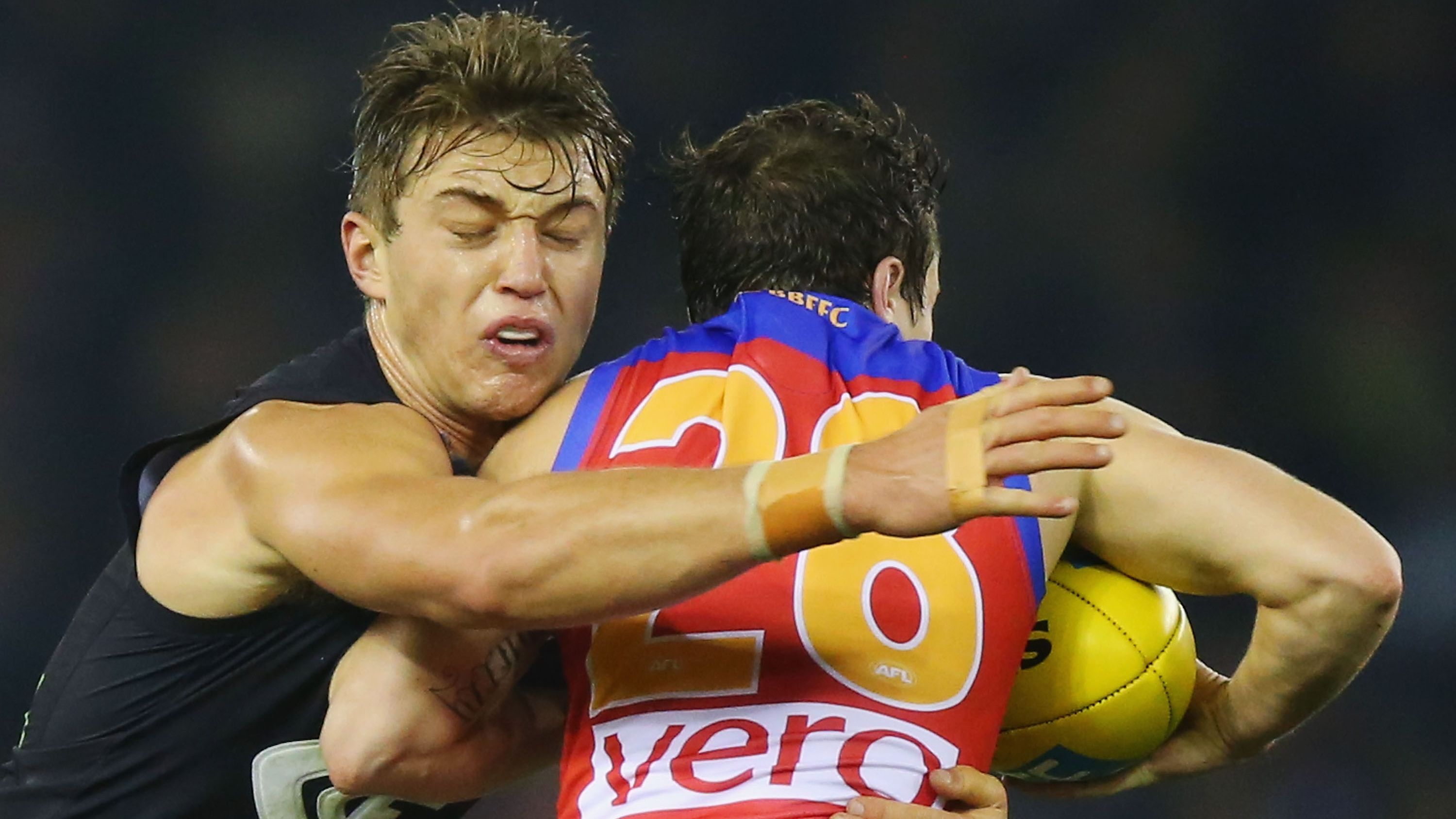 Patrick Cripps lays a tackle.