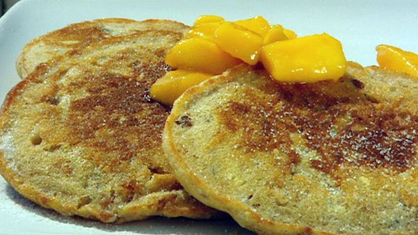 Muesli pancakes with butterscotch & mango sauce