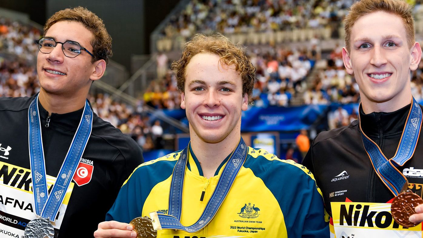 Sam Short (centre) poses with his gold medal after winning the 400m freestyle at the 2023 Fukuoka World Championships. Tunisian star Ahmed Hafnaoui (left) poses with silver. Lukas Martens of Germany (right) clinched bronze.