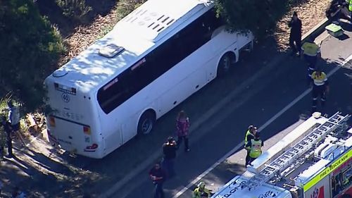 Bus carrying 40 students crashes into tree in Sydney's west