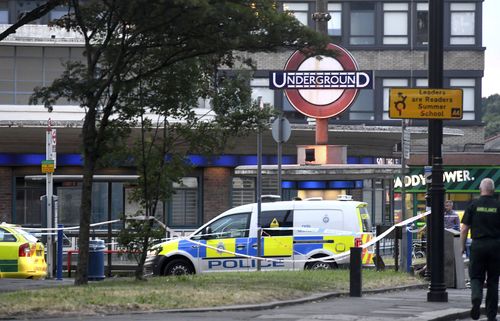 Police remain at the scene of an explosion at Southgate station.