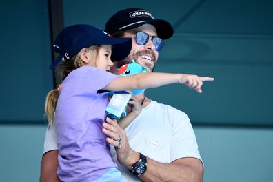 Actor Chris Hemsworth and daughter India Rose Hemsworth attend the swimming on day three of the Gold Coast 2018 Commonwealth Games at Optus Aquatic Centre on April 7, 2018 on the Gold Coast, Australia.