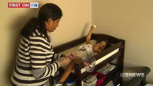 Seena and Manu provide round the clock care for Mary, along with her brother. (9NEWS)