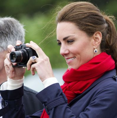 Kate Middleton takes photo with a camera