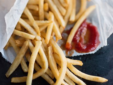 french fries hot chips and tomato sauce