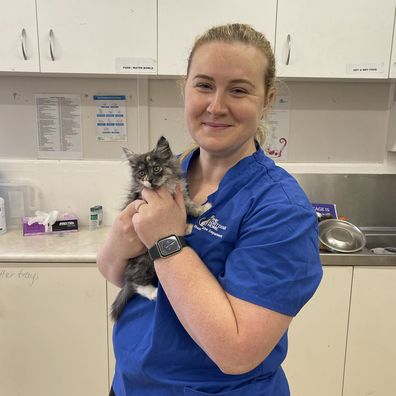 Dr Jessica Wilde poses with a kitten.
