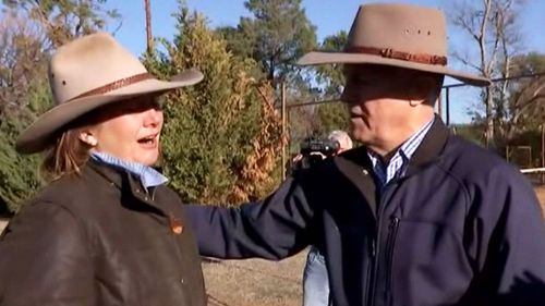 Prime Minister Malcolm Turnbull embraced a woman struggling with the devastating drought during his tour of the region yesterday. Picture: 9NEWS
