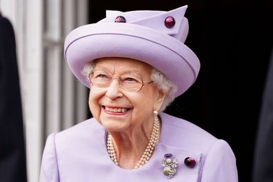 Queen Elizabeth II attends an armed forces act of loyalty parade in the gardens of the Palace of Holyroodhouse, Edinburgh, Tuesday, June 28, 2022.