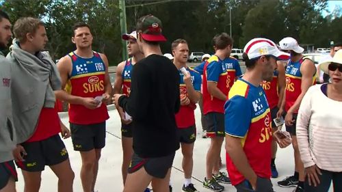 Earlier, Gold Coast Suns players joined the search. (9NEWS)