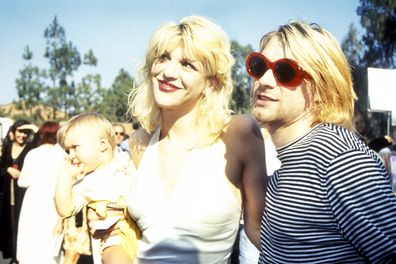 Kurt Cobain with wife Courtney Love and daughter Frances Bean