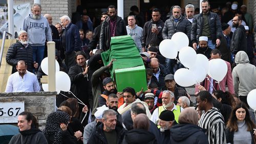 Mourners follow the coffin of Amneh Amy al-Hazouri at Lakemba Mosque, Lakemba, NSW. 26th August, 2022. Photo: Kate Geraghty