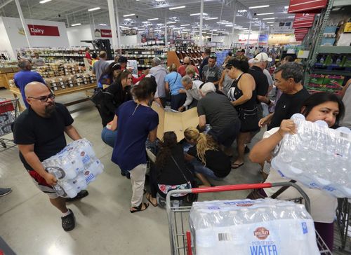 Residents purchase water at BJ Wholesale in preparation for Hurricane Irma in Miami. (AP)