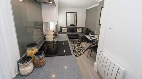 A tiny studio flat in London, without a bed, sold for $529k.