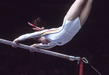 Nadia Comaneci defected to the West the month before which uprising?