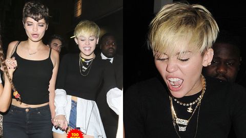 Too rude! Party animal Miley flashes too much in tiny hotpants