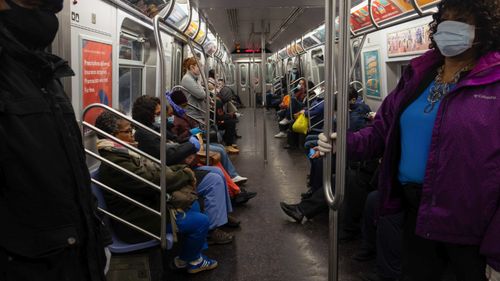 A crowded subway train heading towards Queens during the coronavirus outbreak.