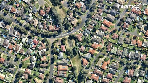 Currans Hill and its yards and parkland. (Nearmap)