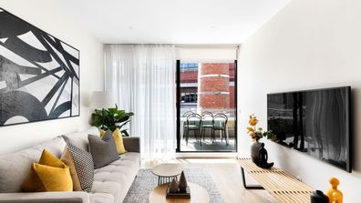 Apartment for sale Domain living room high rise inner city Melbourne property
