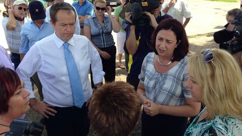 Opposition Leader Bill Shorten and Queensland Labor leader Annastacia Palaszczuk speak with constituents. (AAP)